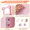 A collage of four close-up images showcasing different features of a pink children's vanity set, with text overlays in German. Voir les images du produit
