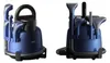 Two views of a blue carpet cleaner with various attachments. Anteprima dell’immagine prodotto
