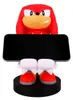 A figurine of the character Knuckles from Sonic the Hedgehog holding a black rectangular object, likely a phone or tablet, in front of it. The figurine is standing on a black circular base. Podgląd zdjęcia produktu