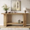 A console table with decorative items and books in a living room setting. Podgląd zdjęcia produktu