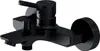 A black bathtub faucet mounted on a white background. Produktbild-Vorschau