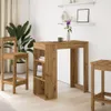 A bar table and stools in a room with a plant and shelves. Náhled obrázku produktu