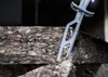 A close-up view of a saw blade inserted into insulation material. Voir les images du produit