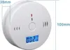 A white smoke and carbon monoxide detector with a digital display and indicator lights. Produktbild-Vorschau