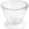 A clear, studio shot of a transparent blender cup with a white base, isolated on a white background. Produktbild-Vorschau