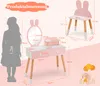 A diagram showing the dimensions of a children's vanity set, with a silhouette of a child for scale. Podgląd zdjęcia produktu