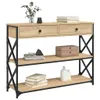 A console table with shelves and drawers, decorated with books, vases, and a plant. Náhled obrázku produktu