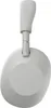 A close-up, studio shot of a silver Sony headphone. Produktbild-Vorschau