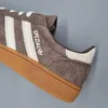 A close-up view of an Adidas Handball Spezial sneaker. Voir les images du produit