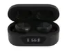 A pair of black wireless earphones in their charging case. Produktbild-Vorschau