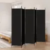 A black, four-panel room divider is set up in a bedroom next to a bed. Náhled obrázku produktu