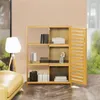 A wooden shelving unit with books and decorative items in a room. Produktbild-Vorschau