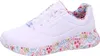 A side view of a white Skechers sneaker with a floral pattern on the sole and interior. Produktbild-Vorschau