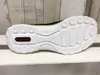 The sole of a shoe is shown against a wooden background. Produktbild-Vorschau