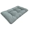 A light blue tufted cushion is shown from a diagonal angle against a white background. Voir les images du produit