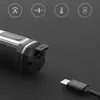 Close-up of the charging port of a cordless drill with a USB-C cable nearby. Icons indicating features are visible at the top. Voir les images du produit