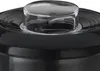 A close-up view of the top of a black stand mixer, focusing on the clear lid and a black base. Anteprima dell’immagine prodotto