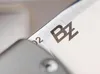 A close-up shot of a knife blade with markings. Náhled obrázku produktu