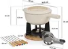 A diagram showing the dimensions of a fondue set. Voir les images du produit