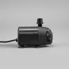 A black water pump with suction cups on a plain gray background. Produktbild-Vorschau
