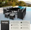 An outdoor rattan furniture set with a table and chairs arranged on a patio next to a swimming pool. Náhled obrázku produktu
