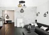 A modern living room with a sectional sofa, coffee table, and various lighting fixtures. Produktbild-Vorschau