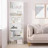 A white bookshelf filled with books and decorative items, placed next to a sofa in a room. Produktbild-Vorschau