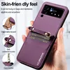 A person is holding a purple phone case with a detachable lanyard and card slots. Produktbild-Vorschau