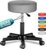 A gray stool with a black base and wheels, with color options displayed on the side. Produktbild-Vorschau