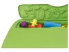 A close-up view of a green play table with various colorful plastic toys inside. Produktbild-Vorschau