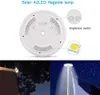 A collage showing the back of a solar flagpole light and two examples of its use at night. Produktbild-Vorschau