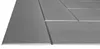 A close-up, angled view of gray decorative foam panels, showing their texture and the grooves between them. Podgląd zdjęcia produktu