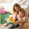 A mother and baby are playing with toys on the floor in a room. Náhled obrázku produktu