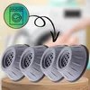 A graphic of a washing machine is connected by a curved arrow to a group of four anti-vibration pads. Podgląd zdjęcia produktu