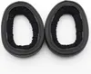 Two black ear pads for headphones are shown against a white background. Produktbild-Vorschau