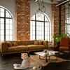 A living room with a sofa, coffee table, and a leopard plush toy. Produktbild-Vorschau