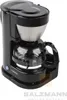 A black Dometic coffee maker is shown against a white background. Produktbild-Vorschau