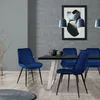 A dining room setting with a table and chairs. Náhled obrázku produktu