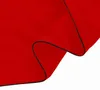 A close-up view of a red fabric with a black trim, folded to show texture and depth. Náhľad obrázku produktu