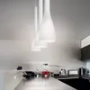 A modern kitchen counter with appliances and three pendant lights hanging above. Náhľad obrázku produktu