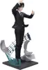 A figurine of a character in a suit standing on a musical-themed base. Produktbild-Vorschau