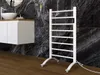 A modern bathroom with a white freestanding towel warmer against a dark marble wall. Produktbild-Vorschau