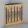A corner acoustic bass trap with a wood grain finish and black inserts, placed in a room corner. Náhľad obrázku produktu