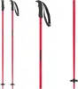 Three red ski poles with black grips and straps are displayed against a white background. Náhled obrázku produktu
