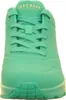 A front view of a turquoise Skechers sneaker. Voir les images du produit