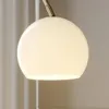 Lindby Bogenlampe Cynthia, messingfarben, Glas, 140 cm, E27 Produktbild-Vorschau 5