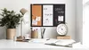 A desk setup with a 3-in-1 notice board, a desk lamp, a plant, and office supplies. Podgląd zdjęcia produktu
