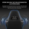 The back of a black gaming chair with blue trim, featuring integrated speakers and sound wave graphics. Produktbild-Vorschau