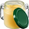 Three glass jars, one filled with a yellow substance and a green lid, are shown against a white background. Podgląd zdjęcia produktu