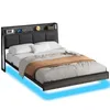 A bed with a headboard featuring storage and LED lighting. Produktbild-Vorschau